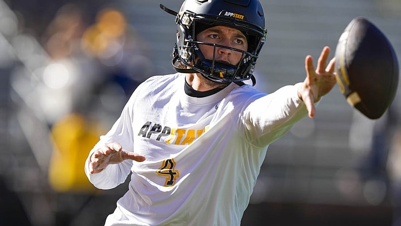 Sep 23, 2023; Laramie, Wyoming, USA; Appalachian State Mountaineers quarterback Joey Aguilar (4) warms up before game against the Wyoming Cowboys at Jonah Field at War Memorial Stadium. Mandatory Credit: Troy Babbitt-USA TODAY Sports