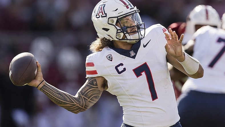 Sep 23, 2023; Stanford, California, USA; Arizona Wildcats quarterback Jayden de Laura (7) passes against the Stanford Cardinal during the first quarter at Stanford Stadium. Mandatory Credit: John Hefti-USA TODAY Sports