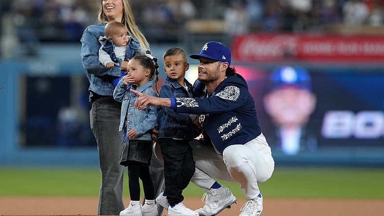Sep 22, 2023; Los Angeles, California, USA; Los Angeles Dodgers relief pitcher Joe Kelly (17) poses with wife Ashley Kelly (Ashley Parks) and children, sons Knox Kelly and Kai Kelly and twins Crue Kelly and Blake Kelly, at Dodger Stadium. Mandatory Credit: Kirby Lee-USA TODAY Sports