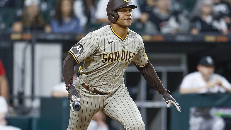 Sep 30, 2023; Chicago, Illinois, USA; San Diego Padres left fielder Juan Soto (22) watches his RBI-double against the Chicago White Sox during the second inning at Guaranteed Rate Field. Mandatory Credit: Kamil Krzaczynski-USA TODAY Sports