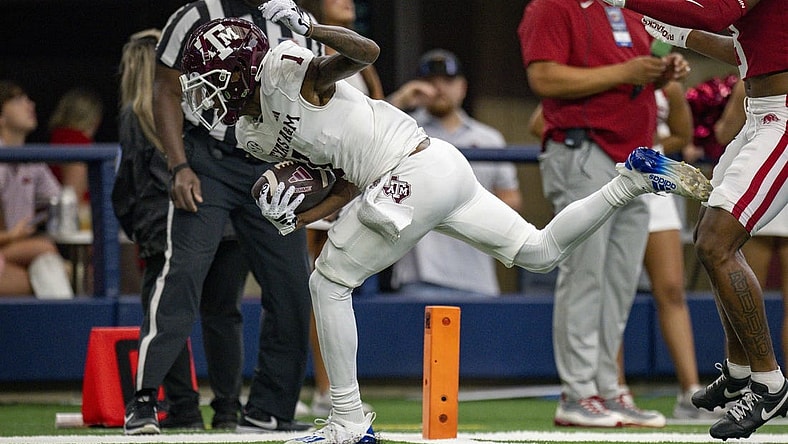 Sep 30, 2023; Arlington, Texas, USA;Texas A&M Aggies wide receiver Evan Stewart (1) scores a touchdown during the game between the Texas A&M Aggies and the Arkansas Razorbacks at AT&T Stadium. Mandatory Credit: Jerome Miron-USA TODAY Sports