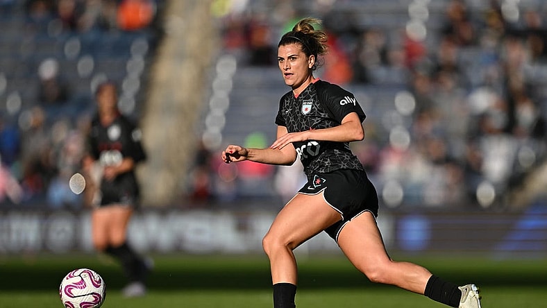 Oct 15, 2023; Bridgeview, Illinois, USA; Chicago Red Stars midfielder Cari Roccaro (4) controls the ball against OL Reign in the first half at SeatGeek Stadium. Mandatory Credit: Daniel Bartel-USA TODAY Sports