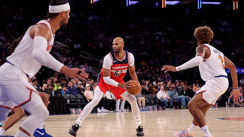 Oct 18, 2023; New York, New York, USA; Washington Wizards forward Taj Gibson (67) controls the ball against the New York Knicks during the fourth quarter at Madison Square Garden. Mandatory Credit: Brad Penner-USA TODAY Sports
