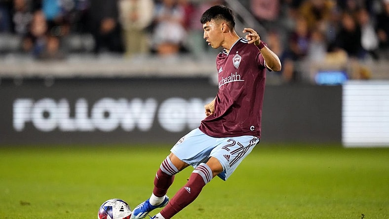 Oct 21, 2023; Commerce City, Colorado, USA; Colorado Rapids defender Sebastian Anderson (27) kicks the ball in the first half against the Real Salt Lake at Dick's Sporting Goods Park. Mandatory Credit: Ron Chenoy-USA TODAY Sports