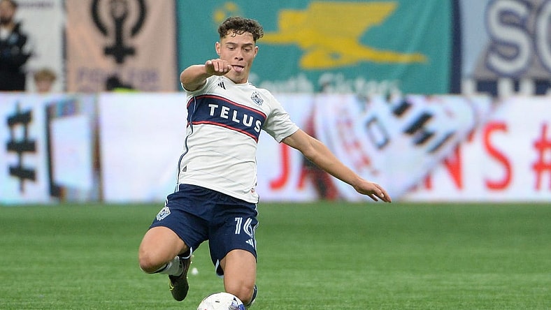 Oct 21, 2023; Vancouver, British Columbia, CAN;  Vancouver Whitecaps FC midfielder Sebastian Berhalter (16) reaches for the ball during the first half against the Los Angeles FC at BC Place. Mandatory Credit: Anne-Marie Sorvin-USA TODAY Sports