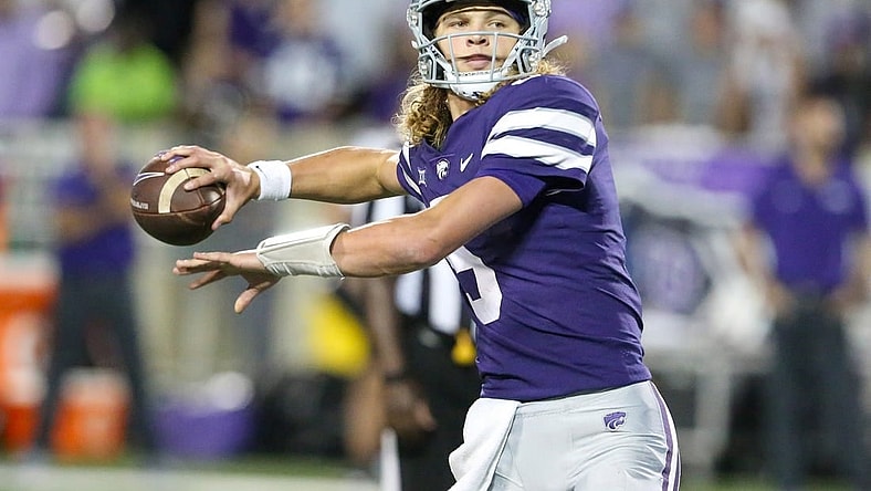 Oct 21, 2023; Manhattan, Kansas, USA; Kansas State Wildcats quarterback Avery Johnson (5) drops back to pass during the first quarter against the TCU Horned Frogs at Bill Snyder Family Football Stadium. Mandatory Credit: Scott Sewell-USA TODAY Sports