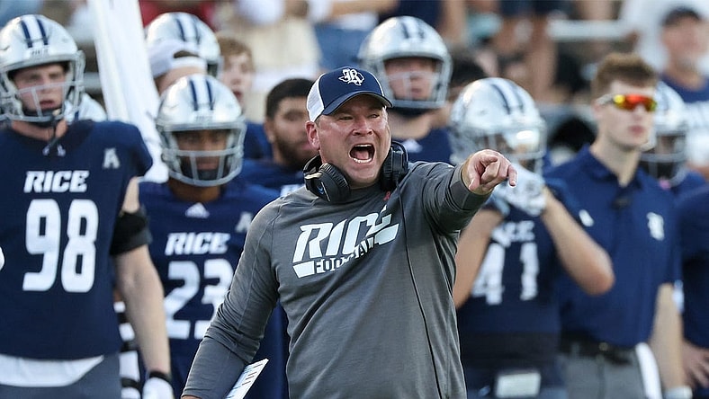 Oct 28, 2023; Houston, Texas, USA; Rice Owls head coach Mike Bloomgren argues about the time clock in the second half against the Tulane Green Wave at Rice Stadium. Mandatory Credit: Thomas Shea-USA TODAY Sports