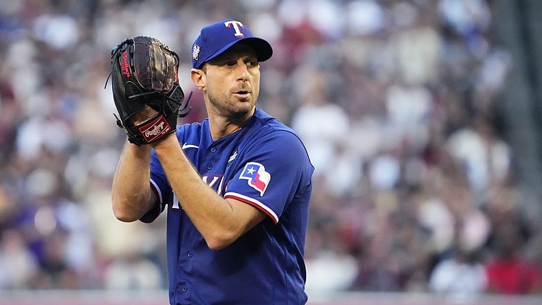 Texas Rangers starting pitcher Max Scherzer (31) prepares to throw a pitch against the Arizona Diamondbacks during the first inning in game three of the 2023 World Series at Chase Field on Oct. 30, 2023, in Phoenix, Arizona.