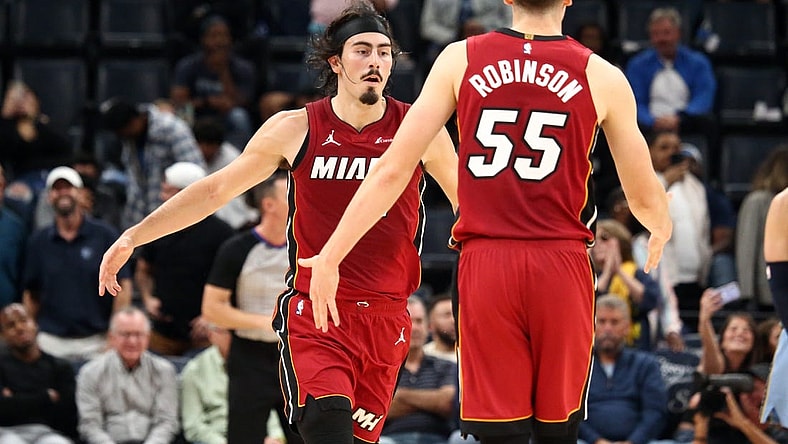 Nov 8, 2023; Memphis, Tennessee, USA; Miami Heat guard Jaime Jaquez Jr. (11) reacts with forward Duncan Robinson (55) after a three point basket during the second half against the Memphis Grizzlies at FedExForum. Mandatory Credit: Petre Thomas-USA TODAY Sports