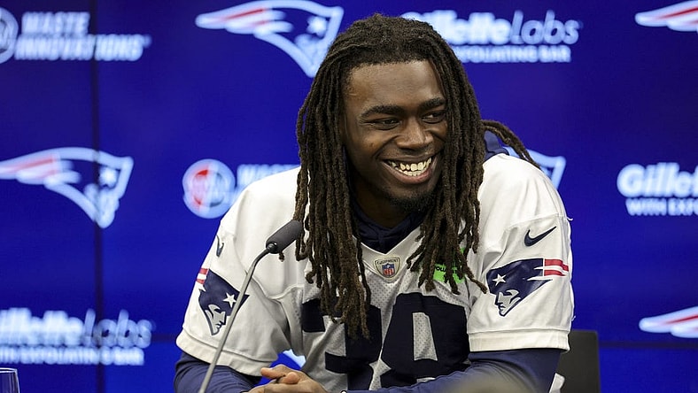 Nov 10, 2023; Frankfurt, Germany;  New England Patriots running back Rhamondre Stevenson (38) speaks to the media before an NFL International Series practice at the Deutcher Fussball-Bund facility. Mandatory Credit: Nathan Ray Seebeck-USA TODAY Sports
