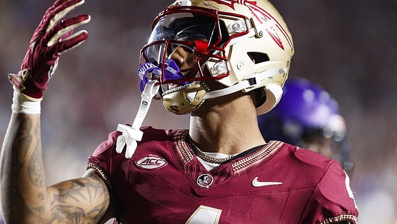 Nov 18, 2023; Tallahassee, Florida, USA; Florida State Seminoles wide receiver Keon Coleman (4) celebrates a touchdown against the North Alabama Lions during the third quarter at Doak S. Campbell Stadium. Mandatory Credit: Morgan Tencza-USA TODAY Sports