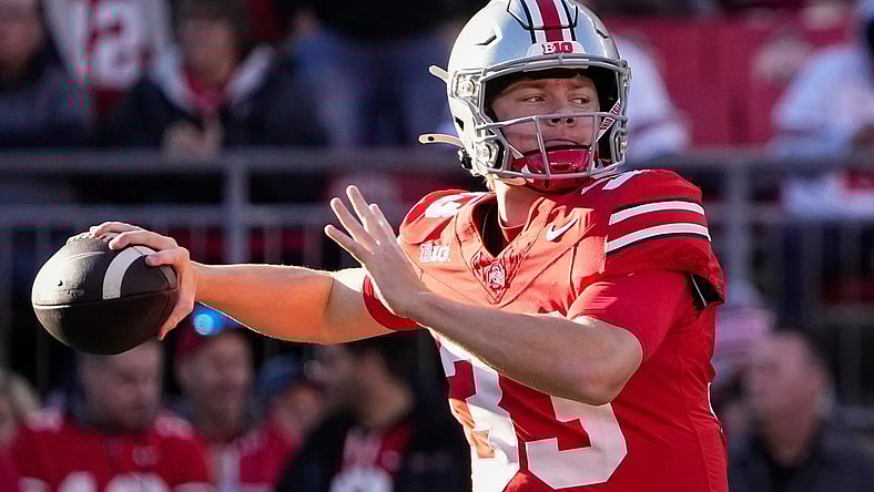Nov 18, 2023; Columbus, Ohio, USA; Ohio State Buckeyes quarterback Devin Brown (33) throws during warm-ups prior to the NCAA football game against the Minnesota Golden Gophers at Ohio Stadium.
