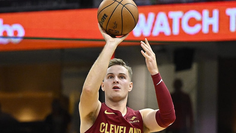 Nov 19, 2023; Cleveland, Ohio, USA; Cleveland Cavaliers guard Sam Merrill (5) shoots in the fourth quarter against the Denver Nuggets at Rocket Mortgage FieldHouse. Mandatory Credit: David Richard-USA TODAY Sports