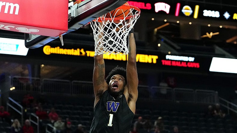 Nov 19, 2023; Las Vegas, NV, USA; Washington Huskies forward Keion Brooks Jr. (1) dunks against the San Diego State Aztecs during the second half at T-Mobile Arena. Mandatory Credit: Stephen R. Sylvanie-USA TODAY Sports