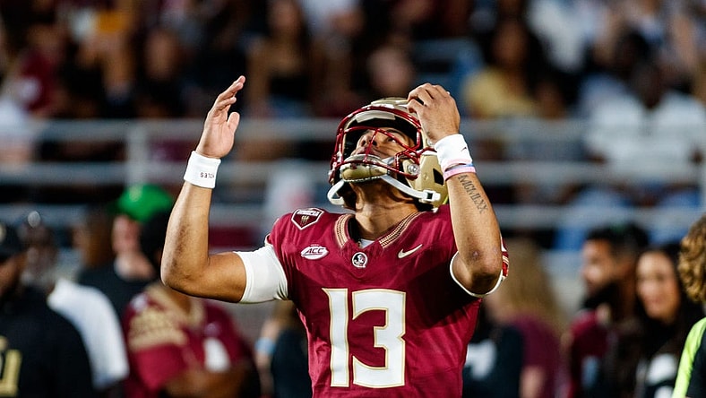 Nov 18, 2023; Tallahassee, Florida, USA; Florida State Seminoles quarterback Jordan Travis (13) during the warm ups before the game against the North Alabama Lions at Doak S. Campbell Stadium. Mandatory Credit: Morgan Tencza-USA TODAY Sports