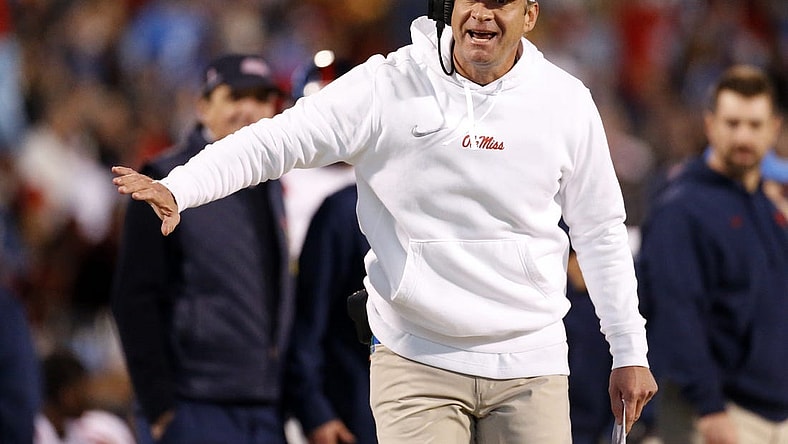 Nov 23, 2023; Starkville, Mississippi, USA; Mississippi Rebels head coach Lane Kiffin reacts during the second half  against the Mississippi State Bulldogs at Davis Wade Stadium at Scott Field. Mandatory Credit: Petre Thomas-USA TODAY Sports