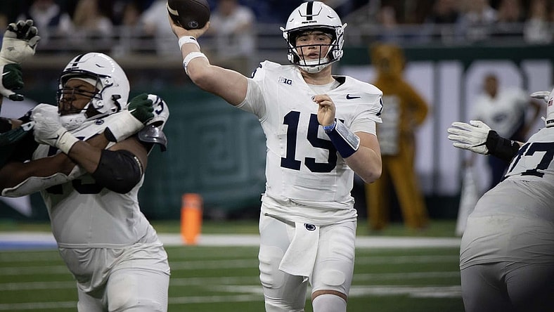 Nov 24, 2023; Detroit, Michigan, USA; Penn State Nittany Lions quarterback Drew Allar (15) passes the ball against the Michigan State Spartans during the second half at Ford Field. Mandatory Credit: David Reginek-USA TODAY Sports