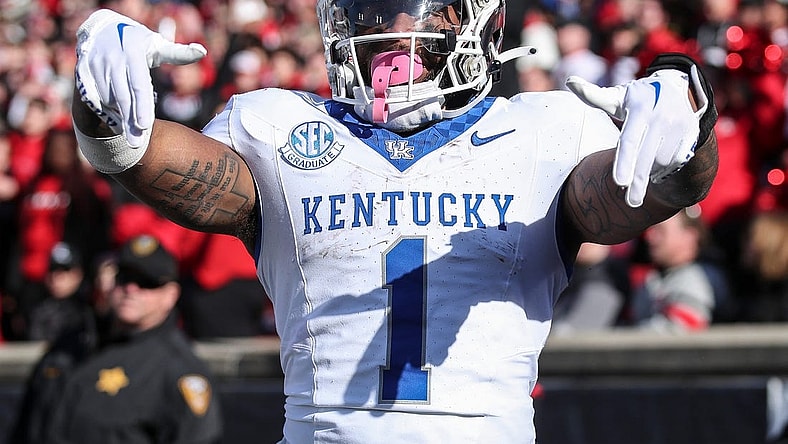Kentucky Wildcats running back Ray Davis (1) reacts after scoring in the third quarter at Louisville on Nov. 25, 2023.