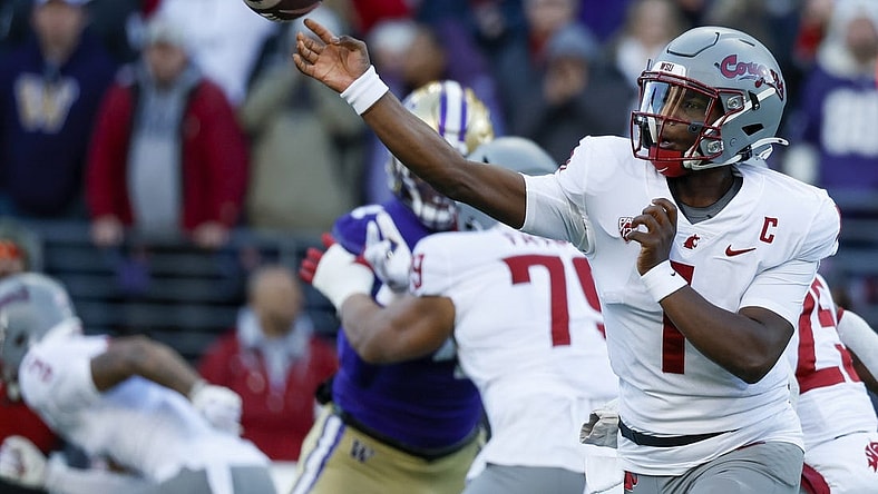 Nov 25, 2023; Seattle, Washington, USA; Washington State Cougars quarterback Cameron Ward (1) passes against the Washington Huskies during the first quarter at Alaska Airlines Field at Husky Stadium. Mandatory Credit: Joe Nicholson-USA TODAY Sports