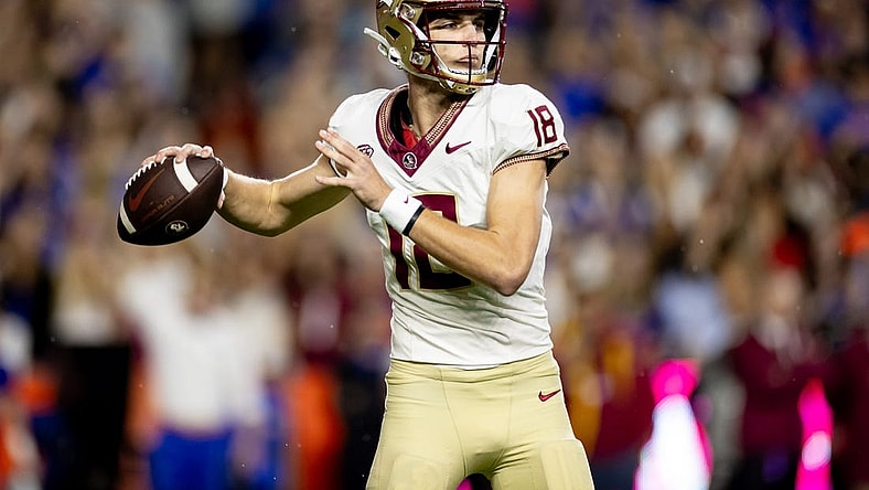 Florida State Seminoles quarterback Tate Rodemaker (18) throws the ball during the first half against the Florida Gators at Steve Spurrier Field at Ben Hill Griffin Stadium in Gainesville, FL on Saturday, November 25, 2023. [Matt Pendleton/Gainesville Sun]