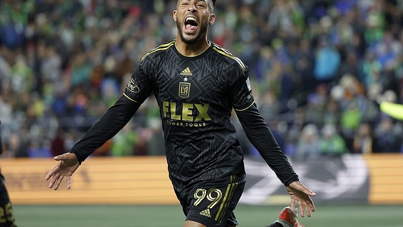 Nov 26, 2023; Seattle, Washington, USA; Los Angeles FC forward Denis Bouanga (99) reacts after scoring during the first half of a MLS Cup Western Conference Semifinal match against the Seattle Sounders at Lumen Field. Mandatory Credit: Joe Nicholson-USA TODAY Sports
