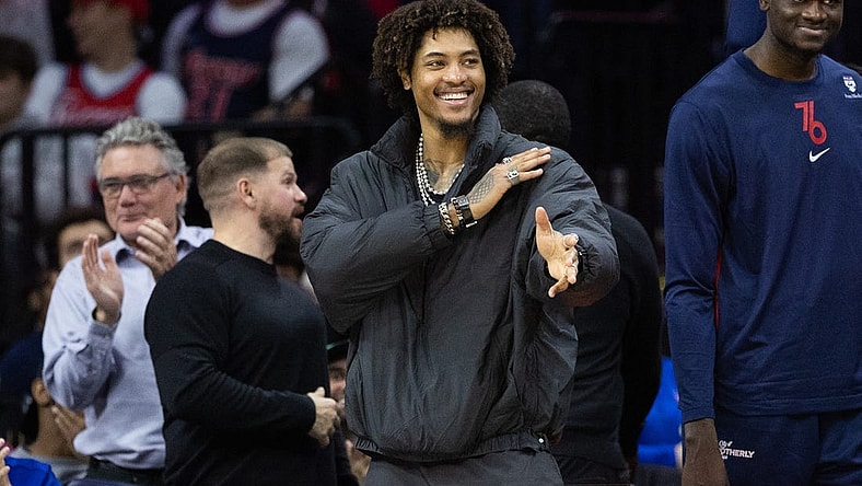 Nov 27, 2023; Philadelphia, Pennsylvania, USA; Philadelphia 76ers guard Kelly Oubre Jr. in street clothes reacts from the bench after a defensive stop against the Los Angeles Lakers during the third quarter at Wells Fargo Center. Mandatory Credit: Bill Streicher-USA TODAY Sports