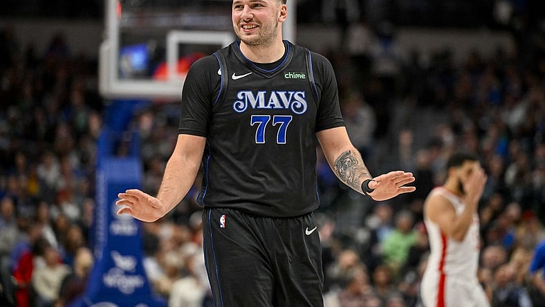 Nov 28, 2023; Dallas, Texas, USA; Dallas Mavericks guard Luka Doncic (77) reacts to a foul call against the Houston Rockets during the second half at the American Airlines Center. Mandatory Credit: Jerome Miron-USA TODAY Sports