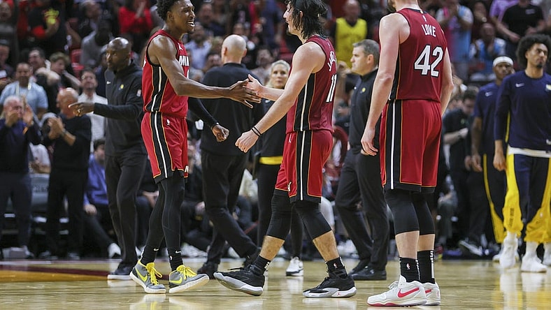 Nov 30, 2023; Miami, Florida, USA; Miami Heat guard Josh Richardson (0) celebrates with guard Jaime Jaquez Jr. (11) against the Indiana Pacers during the fourth quarter at Kaseya Center. Mandatory Credit: Sam Navarro-USA TODAY Sports