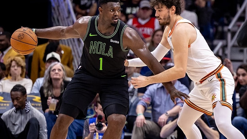 Dec 1, 2023; New Orleans, Louisiana, USA; New Orleans Pelicans forward Zion Williamson (1) looks for separation against San Antonio Spurs forward Cedi Osman (16) during the second half at the Smoothie King Center. Mandatory Credit: Stephen Lew-USA TODAY Sports