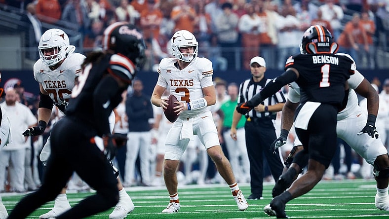 Dec 2, 2023; Arlington, TX, USA;  Texas Longhorns quarterback Quinn Ewers (3) looks to throw during the first quarter against the Oklahoma State Cowboys at AT&T Stadium. Mandatory Credit: Kevin Jairaj-USA TODAY Sports