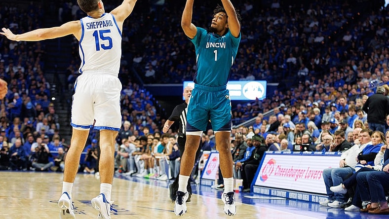 Dec 2, 2023; Lexington, Kentucky, USA; North Carolina-Wilmington Seahawks guard Donovan Newby (1) shoots the ball against Kentucky Wildcats guard Reed Sheppard (15) during the first half at Rupp Arena at Central Bank Center. Mandatory Credit: Jordan Prather-USA TODAY Sports