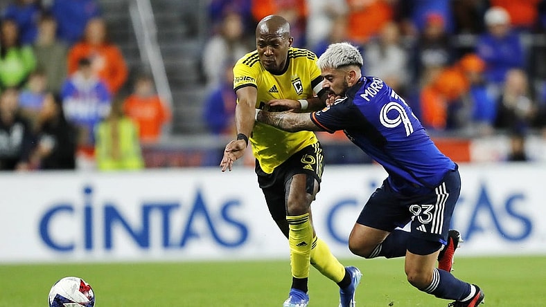 Dec 2, 2023; Cincinnati, Ohio, USA; Columbus Crew midfielder Darlington Nagbe (6) battles for the ball against FC Cincinnati midfielder Junior Moreno (93) during the first half at TQL Stadium. Mandatory Credit: Katie Stratman-USA TODAY Sports