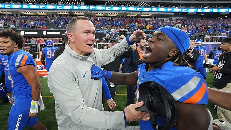 Dec 2, 2023; Las Vegas, NV, USA; Boise State Broncos head coach Spencer Danielson celebrates with running back Ashton Jeanty (2) after 44-20 victory over the UNLV Rebels in the Mountain West Championship at Allegiant Stadium. Mandatory Credit: Kirby Lee-USA TODAY Sports