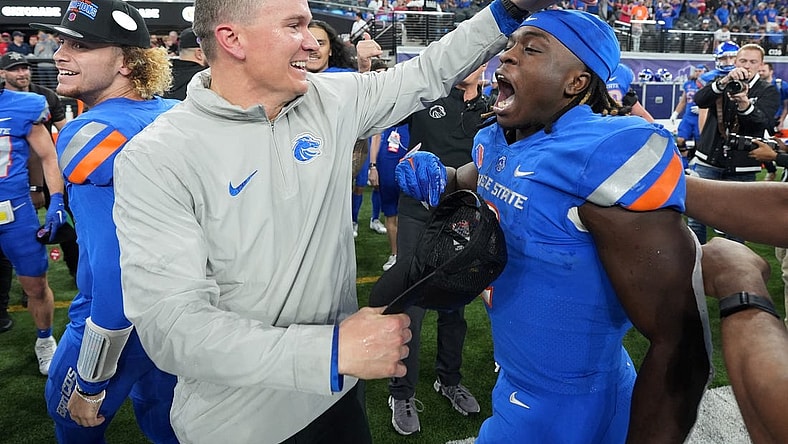 Dec 2, 2023; Las Vegas, NV, USA; Boise State Broncos head coach Spencer Danielson celebrates with running back Ashton Jeanty (2) after 44-20 victory over the UNLV Rebels in the Mountain West Championship at Allegiant Stadium. Mandatory Credit: Kirby Lee-USA TODAY Sports