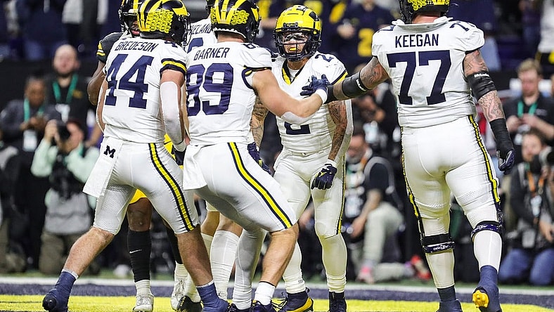 Michigan running back Blake Corum celebrates a touchdown against Iowa during the first half of the Big Ten championship game at Luca Oil Stadium in Indianapolis, Ind. on Saturday, Dec. 2, 2023.