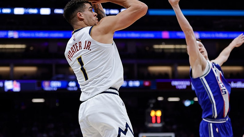 Dec 2, 2023; Sacramento, California, USA; Denver Nuggets forward Michael Porter Jr. (1) shoots the ball against Sacramento Kings guard Kevin Huerter (9) during the second quarter at Golden 1 Center. Mandatory Credit: Sergio Estrada-USA TODAY Sports