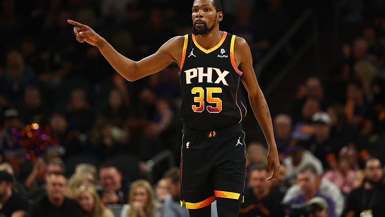 Dec 2, 2023; Phoenix, Arizona, USA; Phoenix Suns forward Kevin Durant (35) against the Memphis Grizzlies in the second half at Footprint Center. Mandatory Credit: Mark J. Rebilas-USA TODAY Sports