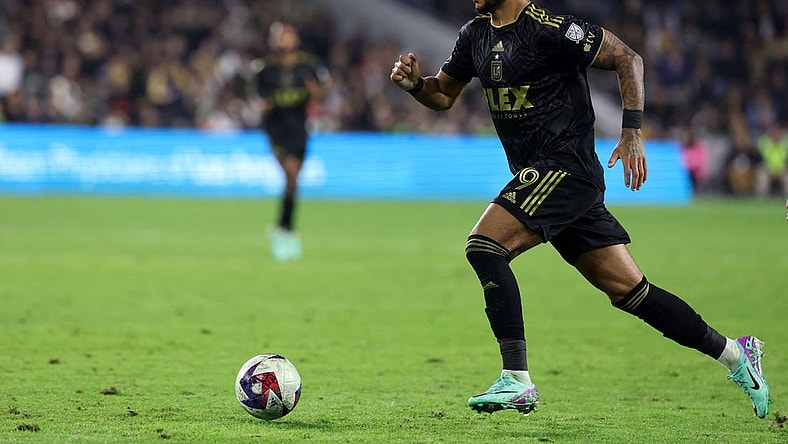 Dec 2, 2023; Los Angeles, California, USA; Los Angeles FC forward Denis Bouanga (99) dribbles the ball during the second half against the Houston Dynamo at BMO Stadium. Mandatory Credit: Kiyoshi Mio-USA TODAY Sports