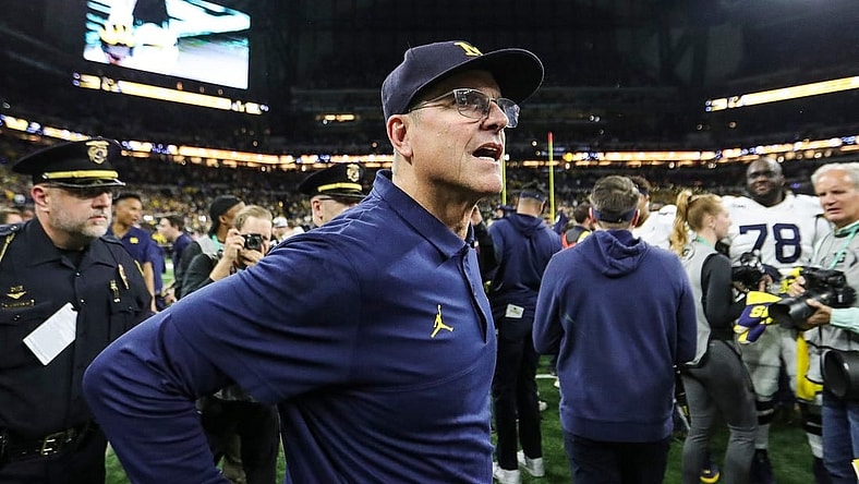 Michigan coach Jim Harbaugh celebrates U-M's 26-0 win over Iowa in the Big Ten championship game in Indianapolis on Saturday, Dec. 2, 2023.