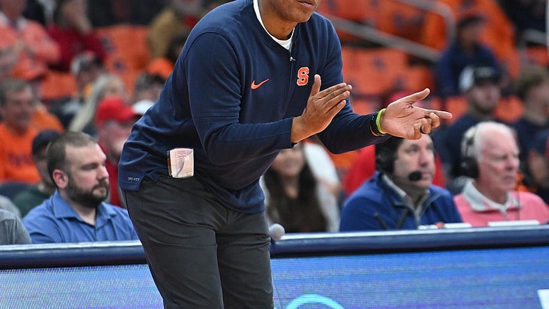 Dec 5, 2023; Syracuse, New York, USA; Syracuse Orange head coach Adrian Autry encourages his players on the court against the Cornell Big Red in the second half at the JMA Wireless Dome. Mandatory Credit: Mark Konezny-USA TODAY Sports