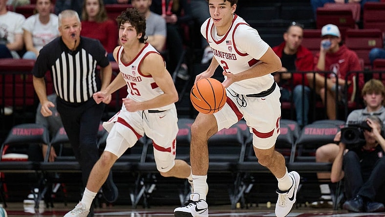 Dec 3, 2023; Stanford, California, USA; Stanford Cardinal guard Andrej Stojakovic (2) brings the ball up court with guard Benny Gealer (15) against the San Diego Toreros during the first half at Maples Pavilion. Mandatory Credit: Robert Edwards-USA TODAY Sports