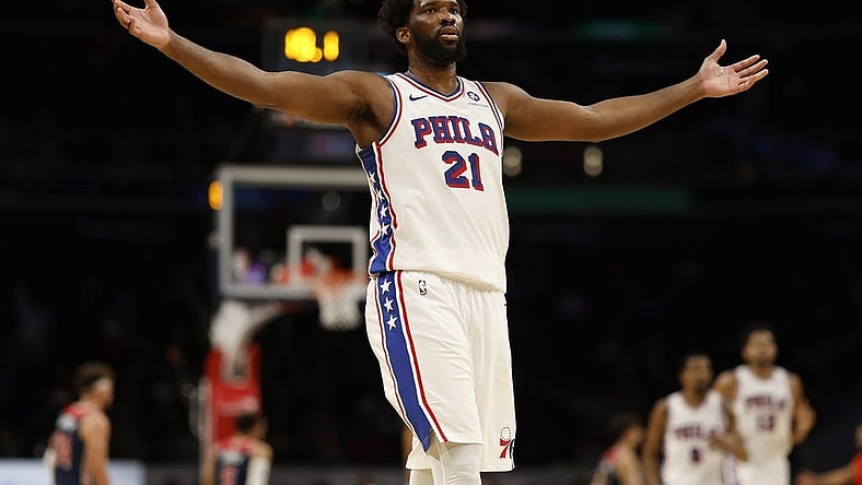 Dec 6, 2023; Washington, District of Columbia, USA; Philadelphia 76ers center Joel Embiid (21) celebrates after scoring his 50th point of the game against the Washington Wizards in the fourth quarter at Capital One Arena. Mandatory Credit: Geoff Burke-USA TODAY Sports