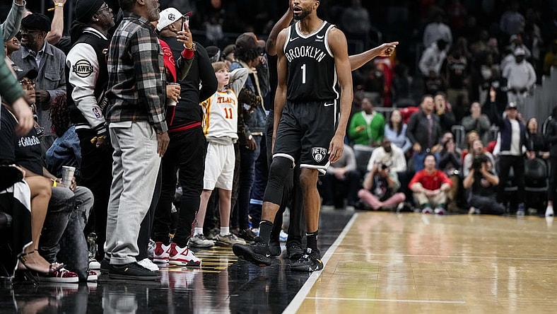 Dec 6, 2023; Atlanta, Georgia, USA; Brooklyn Nets forward Mikal Bridges (1) reacts with the fans after making the eventual game winning basket against the Atlanta Hawks in the final minute during the second half at State Farm Arena. Mandatory Credit: Dale Zanine-USA TODAY Sports