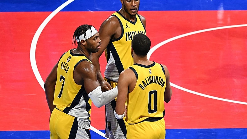 Dec 7, 2023; Las Vegas, Nevada, USA; Indiana Pacers guard Buddy Hield (7), center Myles Turner (33) and guard Tyrese Haliburton (0) celebrate after a victory against the Milwaukee Bucks at T-Mobile Arena. Mandatory Credit: Candice Ward-USA TODAY Sports