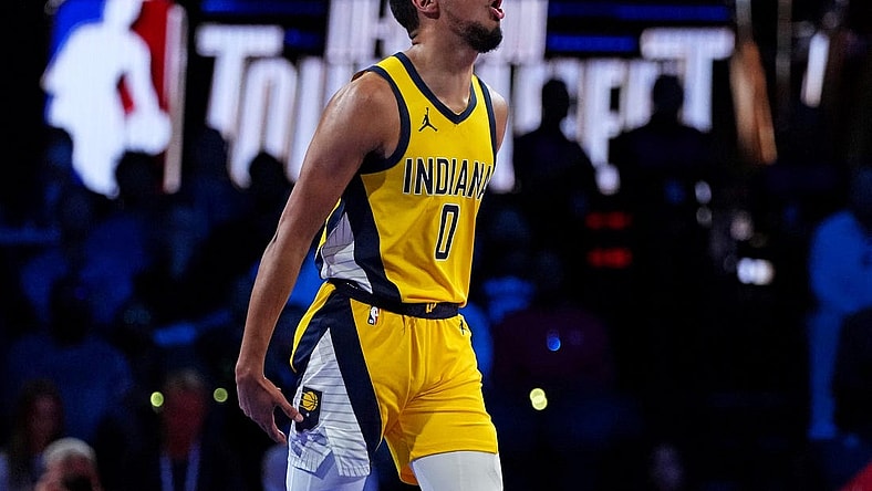 Dec 7, 2023; Las Vegas, Nevada, USA; Indiana Pacers guard Tyrese Haliburton (0) celebrates after beating the Milwaukee Bucks in the NBA In Season Tournament Semifinal at T-Mobile Arena. Mandatory Credit: Kyle Terada-USA TODAY Sports