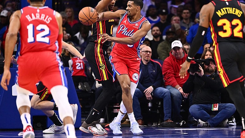Dec 8, 2023; Philadelphia, Pennsylvania, USA; Philadelphia 76ers guard De'Anthony Melton (8) passes the ball against Atlanta Hawks forward De'Andre Hunter (12) in the first quarter at Wells Fargo Center. Mandatory Credit: Kyle Ross-USA TODAY Sports