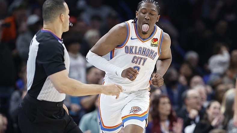 Dec 8, 2023; Oklahoma City, Oklahoma, USA; Oklahoma City Thunder forward Jalen Williams (8) reacts after scoring a basket against the Golden State Warriors during the second half at Paycom Center. Mandatory Credit: Alonzo Adams-USA TODAY Sports
