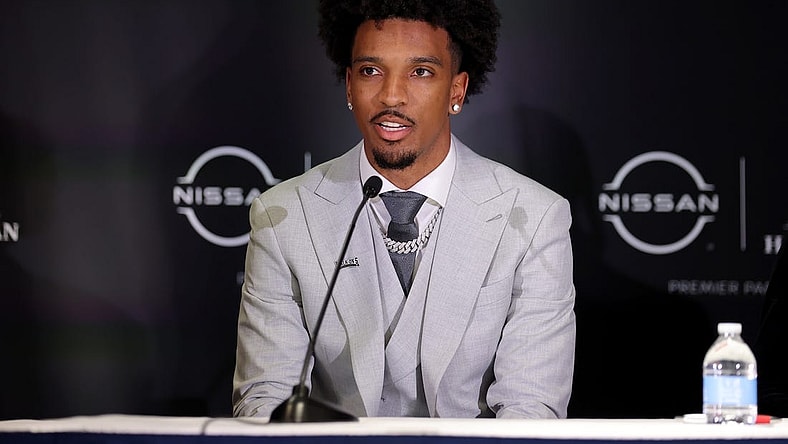 Dec 9, 2023; New York, New York, USA; LSU Tigers quarterback Jayden Daniels speaks to the media during a press conference in the Astor ballroom at the New York Marriott Marquis before the presentation of the Heisman trophy. Mandatory Credit: Brad Penner-USA TODAY Sports