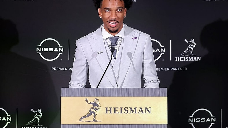Dec 9, 2023; New York, New York, USA; LSU Tigers quarterback Jayden Daniels speaks to the media during a press conference in the Astor ballroom at the New York Marriott Marquis after winning the Heisman trophy. Mandatory Credit: Brad Penner-USA TODAY Sports
