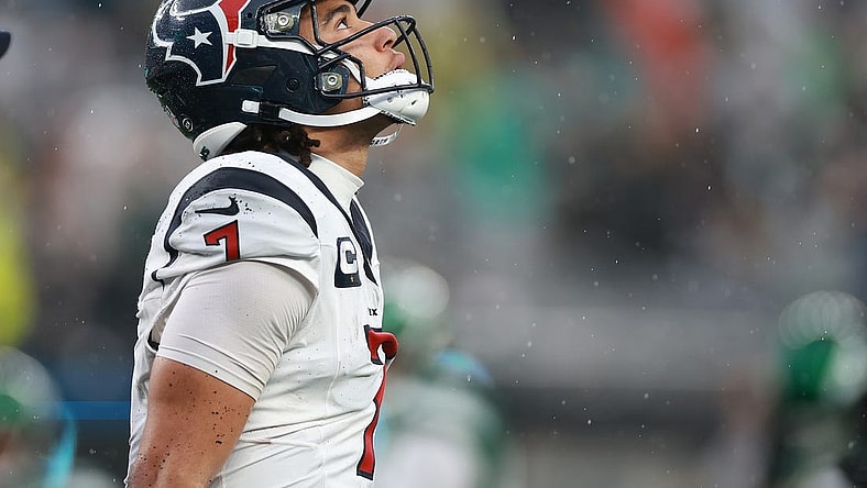 Dec 10, 2023; East Rutherford, New Jersey, USA; Houston Texans quarterback C.J. Stroud (7) walks off the field after an apparent injury during the second half against the New York Jets at MetLife Stadium. Mandatory Credit: Vincent Carchietta-USA TODAY Sports
